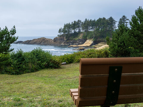 An Empty Bench on a Cloudy Oregon Coast