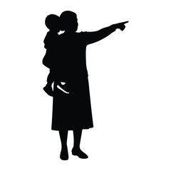 Woman holding child pointing silhouette