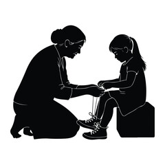 Woman tying childs shoelaces shoes