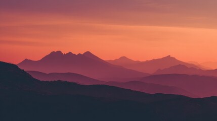 Colorful sunset sky over mountain silhouettes
