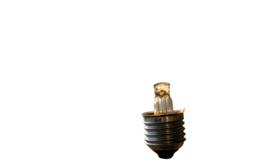 A classic light bulb glows brightly, symbolizing innovation, creativity, and the spark of a new idea. on AI generated by PNG