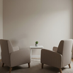 Cozy armchairs facing each other with a small plant on table  
