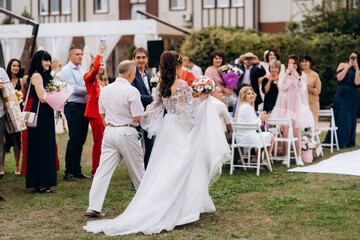 wedding ceremony of the newlyweds on the glade © omelnickiy