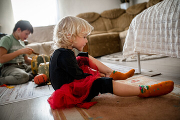 Girl has Halloween fun at home in costume