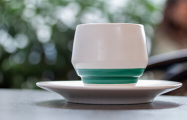 a cup of coffee on a table