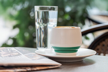 a cup of coffee on a table