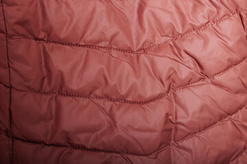 Winter puffer coat material texture background