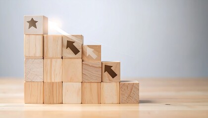 Wooden blocks stacked in a staircase formation, with upward arrows and a star