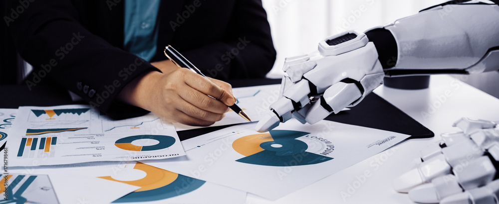 Poster A futuristic setting where a robot collaborates with a human, showcasing charts and graphs. This image represents the blending of technology with human creativity in the workplace.Noogenesis