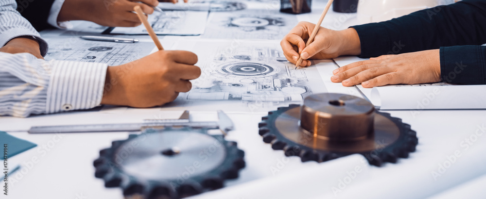 Poster a team of engineers and designers collaborates on technical drawings while surrounded by gears and t