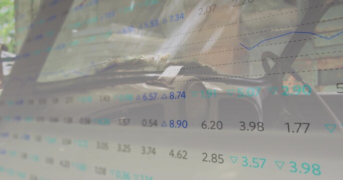 Fototapeta Showing car dashboard and steering wheel inside parked vehicle, with financial data overlay