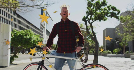 Commuter holding white road bicycle and standing on sunlit plaza, with backpack and cable lock