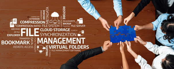 A diverse team of professionals collaborates to organize and manage files in a modern workspace,...