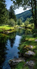 Scenic river flowing through a lush green valley. Reflecting trees and mountains. Clear water