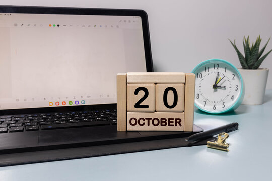 Wooden calendar with the date October 20