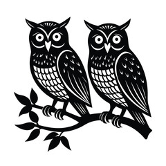 Two owls perched on intertwined branch