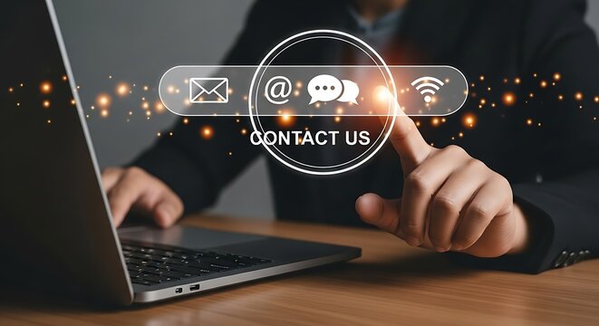 Modern business contact options display on a laptop screen with a finger pointing to reach out for support and communication services now