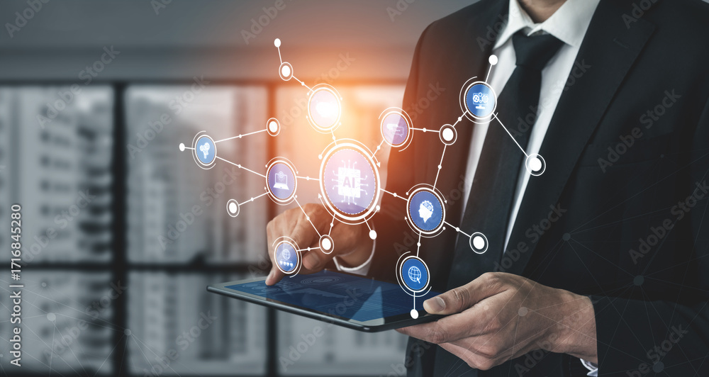 Poster A businessman operates a tablet displaying artificial intelligence technology icons in a modern office, symbolizing digital innovation and data-driven transformation. Tessel