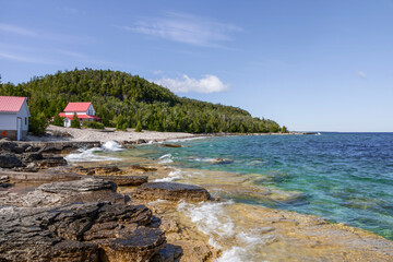 Flowerpot Island in Ontario offers stunning views and unique geological formations on the shores of Georgian Bay.