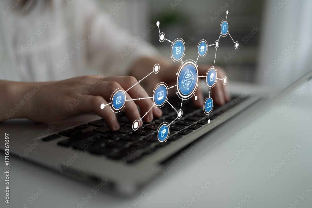 Poster close-up of hands typing on a laptop keyboard surrounded by digital icons, showcasing the integratio