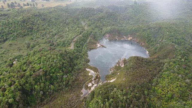 Aerial Drone View of Inferno Crater Lake and Frying Pan Lake with Sulphur Steam in Waimangu Volcanic Valley, New Zealand