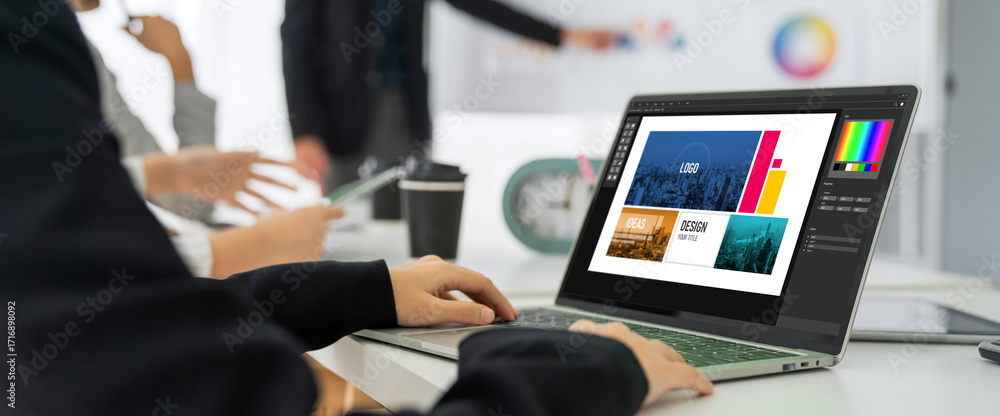Poster graphic designer software for modern design of web page and commercial ads showing on the computer s