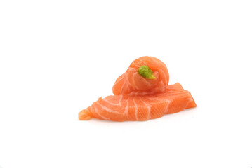 Sashimi made from salmon and wasabi on a white background. Japanese style food.