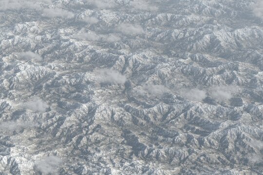 Aerial view of snow-capped mountain ranges