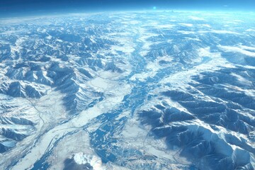 High-angle view of icy mountains and valleys