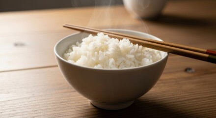Perfectly Steamed Rice Bowl with Chopsticks, Ready to Enjoy on Wooden Table