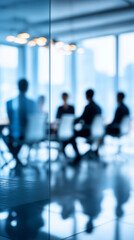 Silhouettes of business people in a modern glass conference room during a corporate meeting. 
