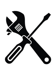 Black silhouette of crossed wrench and screwdriver tools