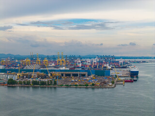 Obraz premium Aerial view cargo ships are docked at large export warehouse in Laem chabang port