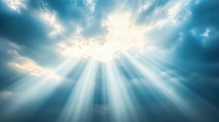 Fototapeta premium Bright sunlight breaks through dark clouds creating a dramatic sky scene above a serene landscape at midday