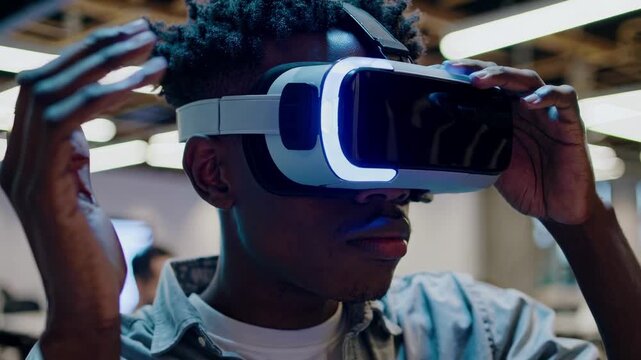 Close-up of a person wearing VR goggles, capturing an immersive video experience. The low-angle shot emphasizes the futuristic tech environment.