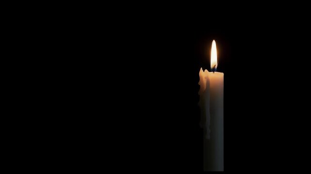 Single white candle flame on dark background for remembrance, hope, and peace