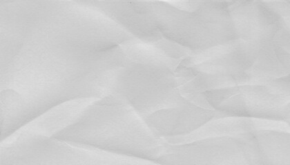 Crumpled white paper texture with visible creases and folds, ideal for backgrounds or design elements. surface shows subtle shadows and highlights, creating realistic and tactile appearance