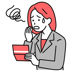 預金通帳を見て困惑するスーツの女性