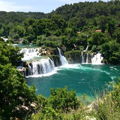 Fototapeta premium Lush waterfalls cascading through a verdant valley