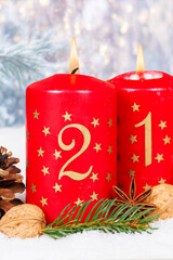 Second 2nd Sunday in advent Christmas time copyspace copy space with burning candle snow winter