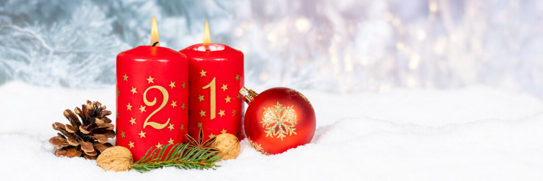 Second 2nd Sunday in advent Christmas time panorama copyspace copy space with burning candle snow winter