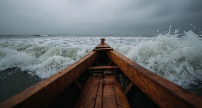 Boat navigating rough sea under stormy sky.