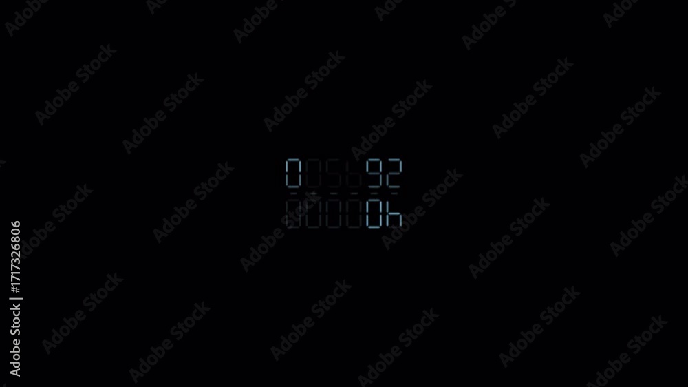 Poster digital counter displaying numbers in a dark environment.