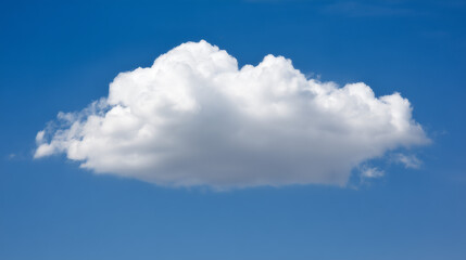 Obraz premium daylight. Fluffy white cloud against blue sky, minimalist nature composition with ample negative space and soft daylight. travel magazines. 