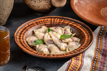 Traditional Ukrainian cherry dumplings in rustic style