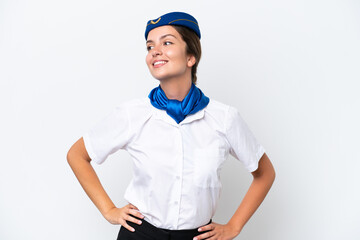 Airplane stewardess caucasian woman isolated on white background posing with arms at hip and smiling