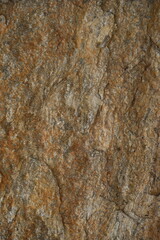 Natural stone wall and tile texture brown and grey rock surface close up, rustic masonry background, construction material detail for architecture, interior design, 3D modeling and decorative concept 