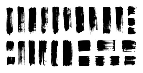 Collection of Black Brush Strokes and Paint Splatters on White Background