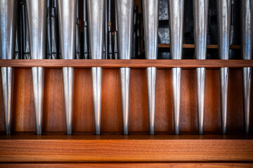close up pattern of organ pipes 