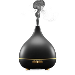Elegant Black Tear-Shaped Aromatherapy Diffuser with Gold Base and Soothing Steam in Tranquil Spa Setting on Reflective Surface